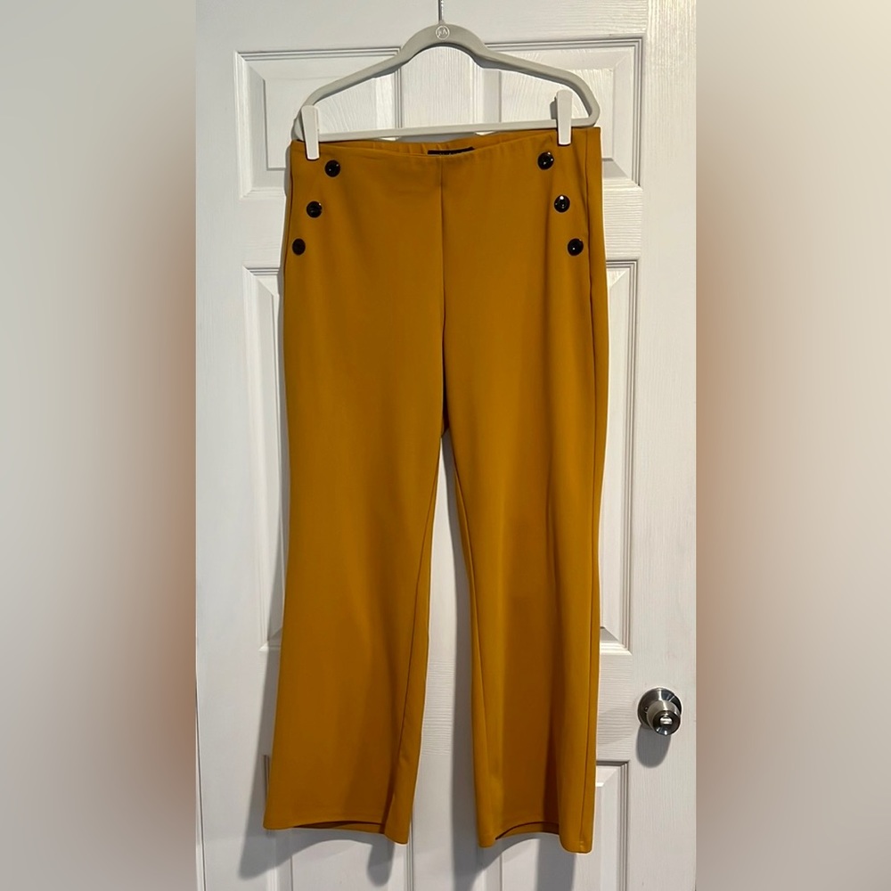 Yellow pants with Black button details